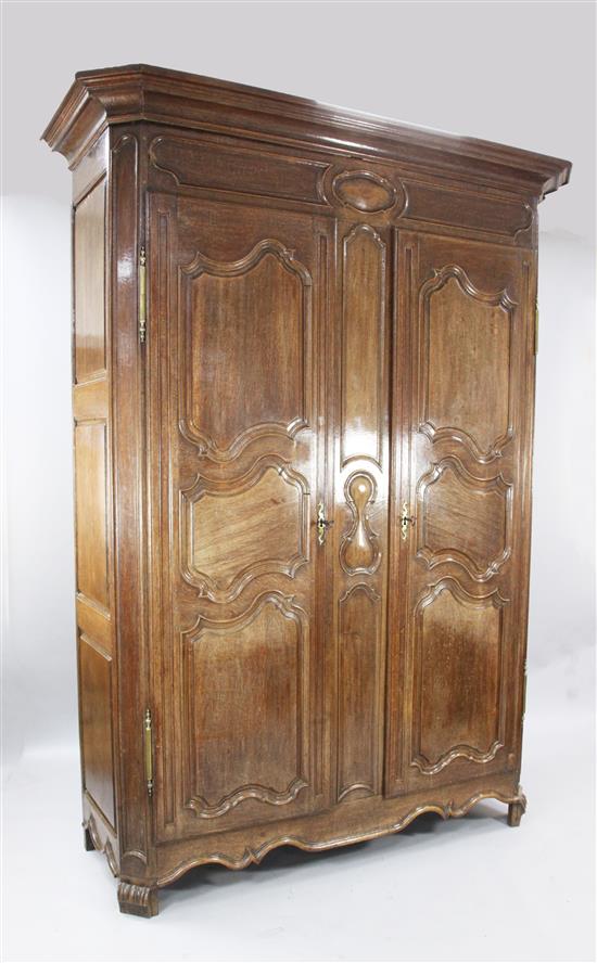 A 19th century French oak armoire, W.5ft 7in. D.2ft 2in. H.7ft 9in.